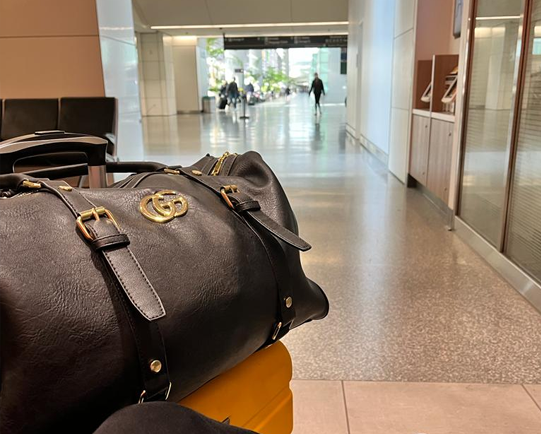 Luggage in an airport concourse