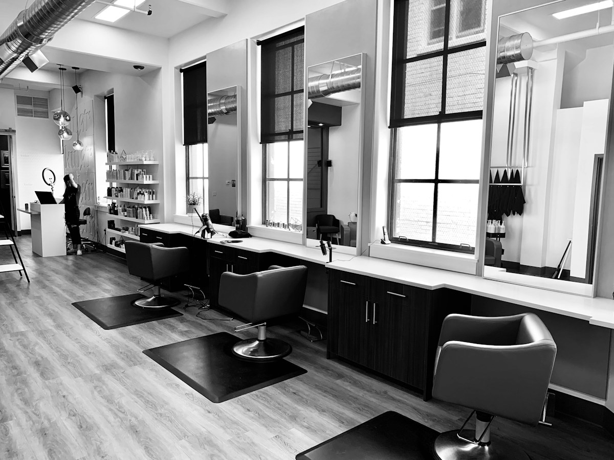 Real salon interior with styling stations