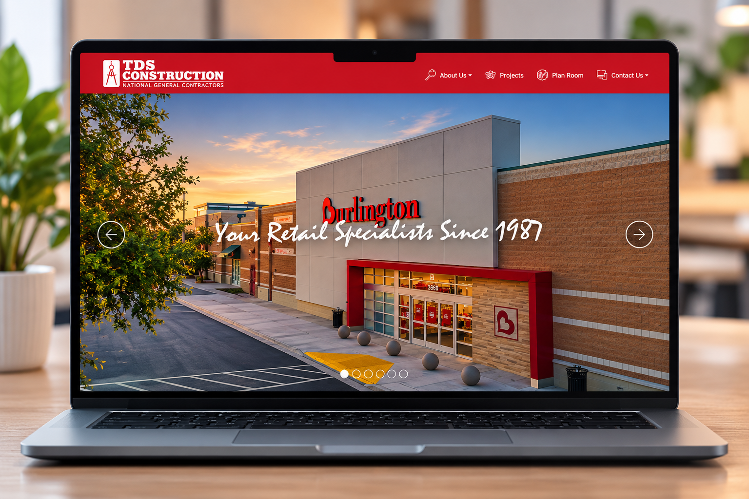 Actual TDS Construction company website shown on a laptop