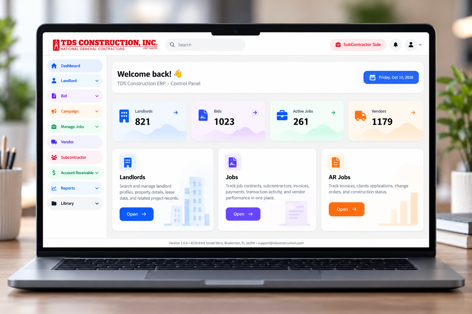 Actual TDS Construction ERP dashboard shown on a laptop